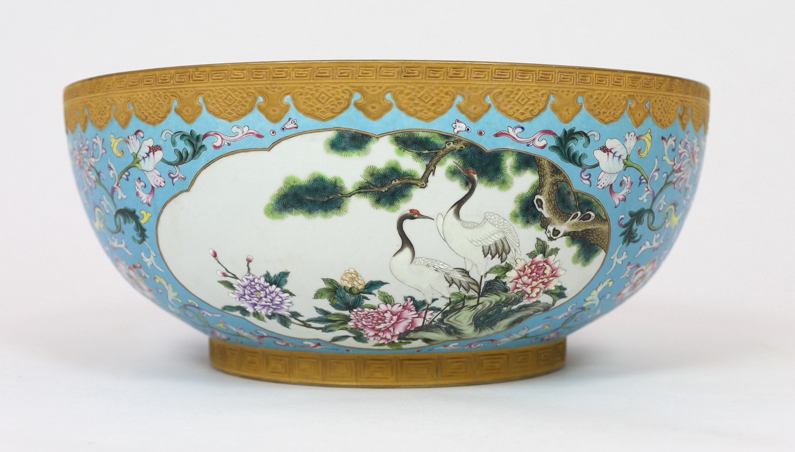 A large Chinese enamelled porcelain fish or punch bowl, Qianlong mark but modern, gilding worn